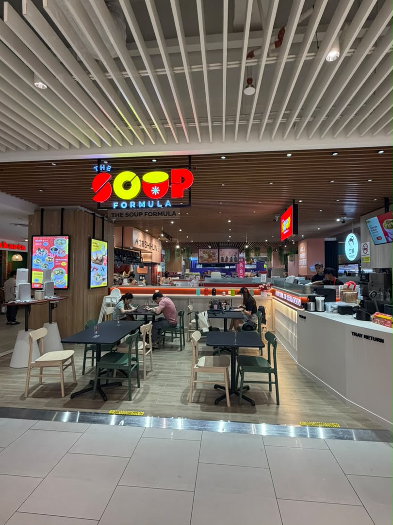 The Soup Formula outlet at Pearl Point Shopping Mall with dining tables and soup counter