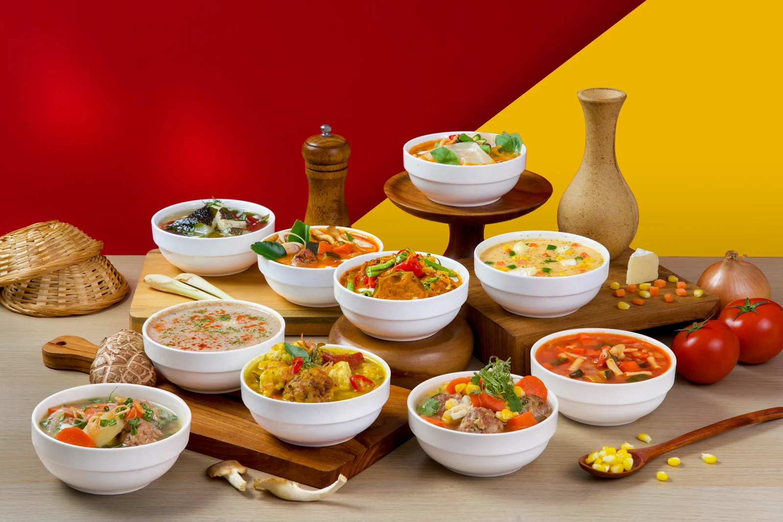 A colourful spread of The Soup Formula soups against our red and yellow backdrop